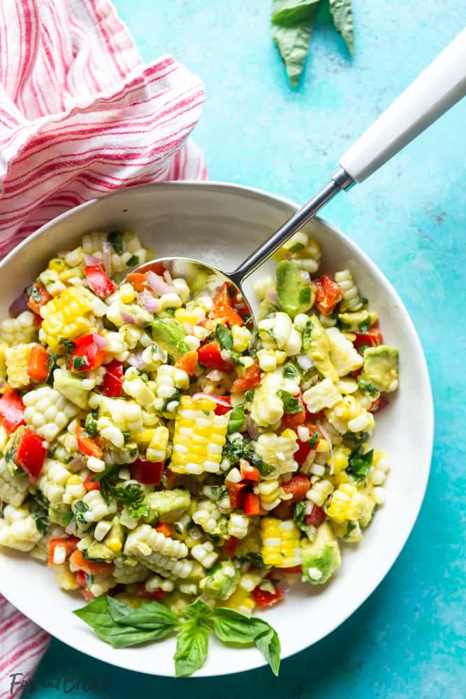 This Fresh Summer Corn Salad is the best side dish to bring to a BBQ, cookout or picnic!  It uses fresh summer produce and can be made ahead of time. | Easy Corn Salad Recipe | BBQ Side Dish | Potluck | cookout | labor day | Fourth of July | Memorial day | Barbque side | Cold food | Make ahead | food to bring to a party