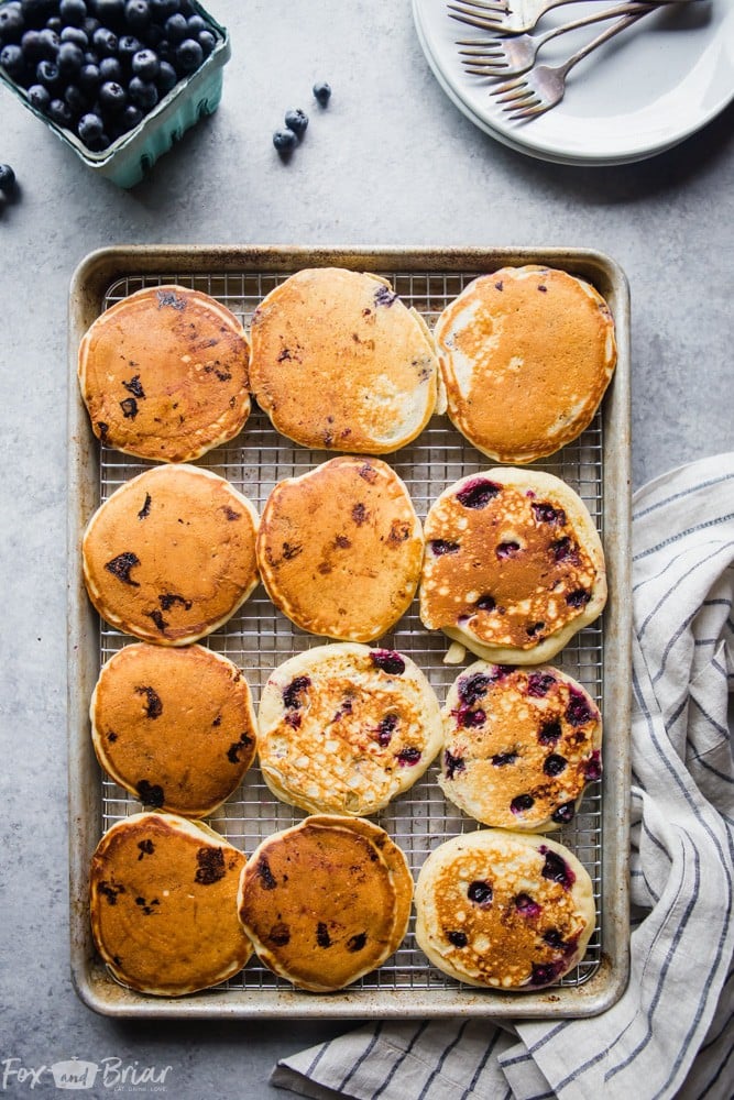 How to make the best buttermilk blueberry pancakes.  Fluffy and tender blueberry pancakes from scratch make the best weekend breakfast or brunch! | Blueberry pancake recipe | Pancakes from scratch | Fluffy blueberry pancakes | Buttermilk blueberry pancake recipe | Tender pancakes | Easy pancake recipe | Homemade pancakes | breakfast recipe | blueberry recipe | Best blueberry pancakes