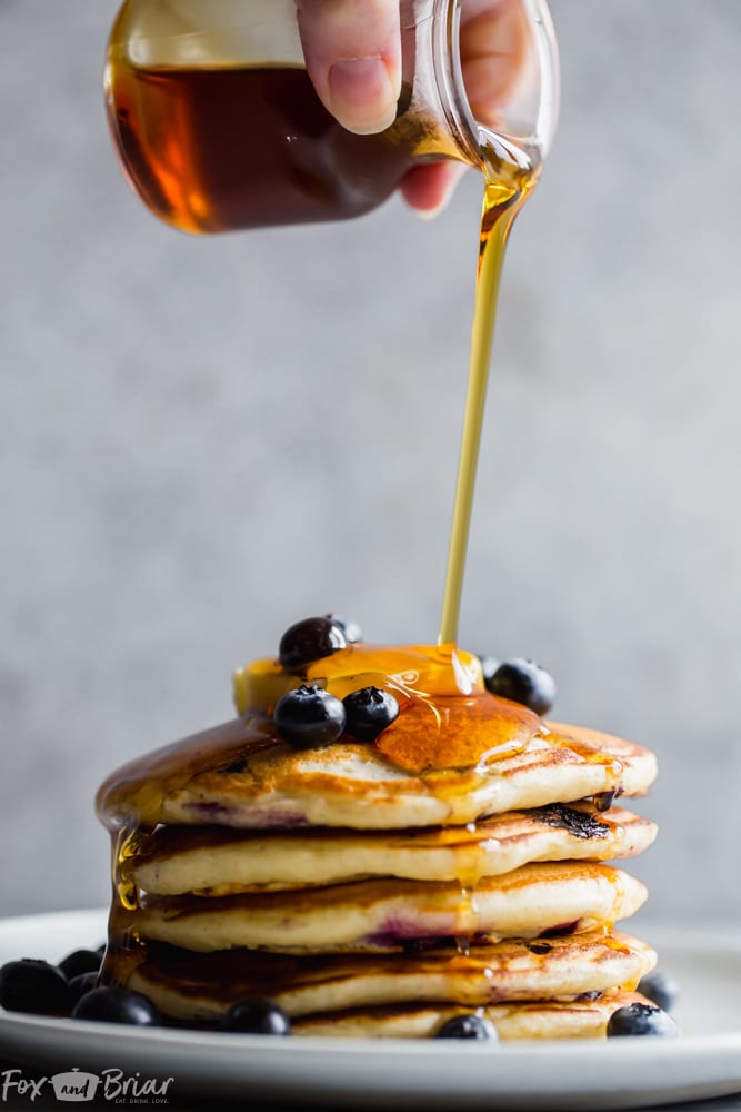 How to make the best buttermilk blueberry pancakes.  Fluffy and tender blueberry pancakes from scratch make the best weekend breakfast or brunch! | Blueberry pancake recipe | Pancakes from scratch | Fluffy blueberry pancakes | Buttermilk blueberry pancake recipe | Tender pancakes | Easy pancake recipe | Homemade pancakes | breakfast recipe | blueberry recipe | Best blueberry pancakes