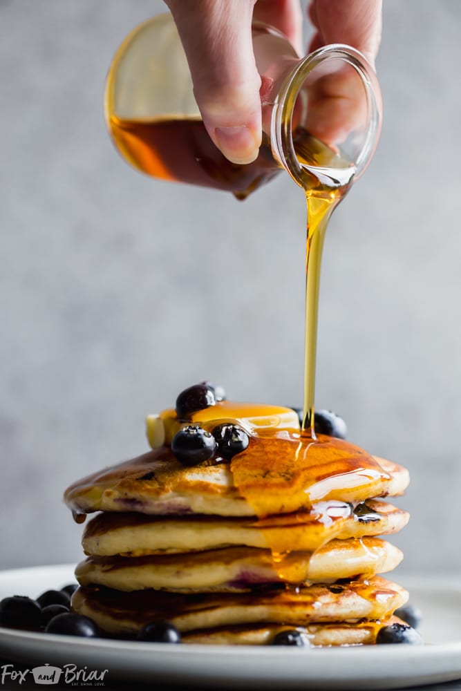 How to make the best buttermilk blueberry pancakes.  Fluffy and tender blueberry pancakes from scratch make the best weekend breakfast or brunch! | Blueberry pancake recipe | Pancakes from scratch | Fluffy blueberry pancakes | Buttermilk blueberry pancake recipe | Tender pancakes | Easy pancake recipe | Homemade pancakes | breakfast recipe | blueberry recipe | Best blueberry pancakes