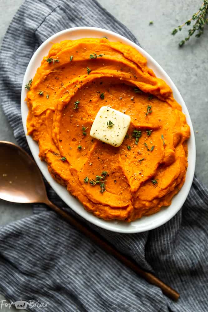 These Instant Pot Maple Chipotle Mashed Sweet Potatoes are an elegant side dish for Thanksgiving or Christmas, but are great as a side dish for a weeknight dinner. A little sweet and a little spicy, these mashed sweet potatoes are fast and easy and made entirely in your electric pressure cooker. | Easy Mashed Sweet Potatoes | Maple syrup sweet potatoes | sweet potato casserole | Thanksgiving recipes | Christmas recipes | Instant pot recipes | how to make sweet potatoes in the instant pot