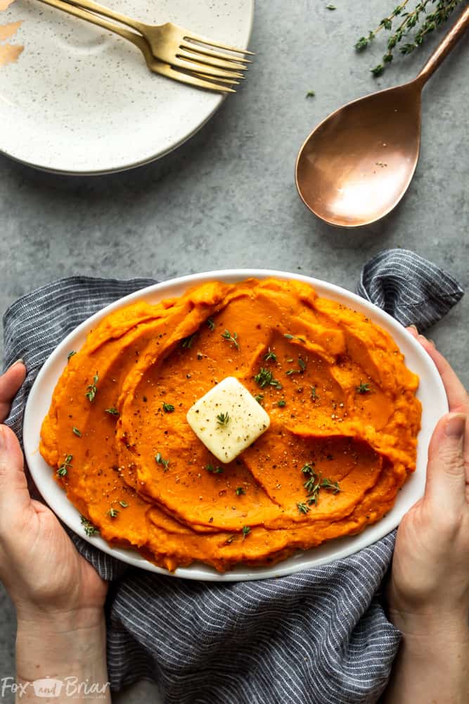 These Instant Pot Maple Chipotle Mashed Sweet Potatoes are an elegant side dish for Thanksgiving or Christmas, but are great as a side dish for a weeknight dinner. A little sweet and a little spicy, these mashed sweet potatoes are fast and easy and made entirely in your electric pressure cooker. | Easy Mashed Sweet Potatoes | Maple syrup sweet potatoes | sweet potato casserole | Thanksgiving recipes | Christmas recipes | Instant pot recipes | how to make sweet potatoes in the instant pot