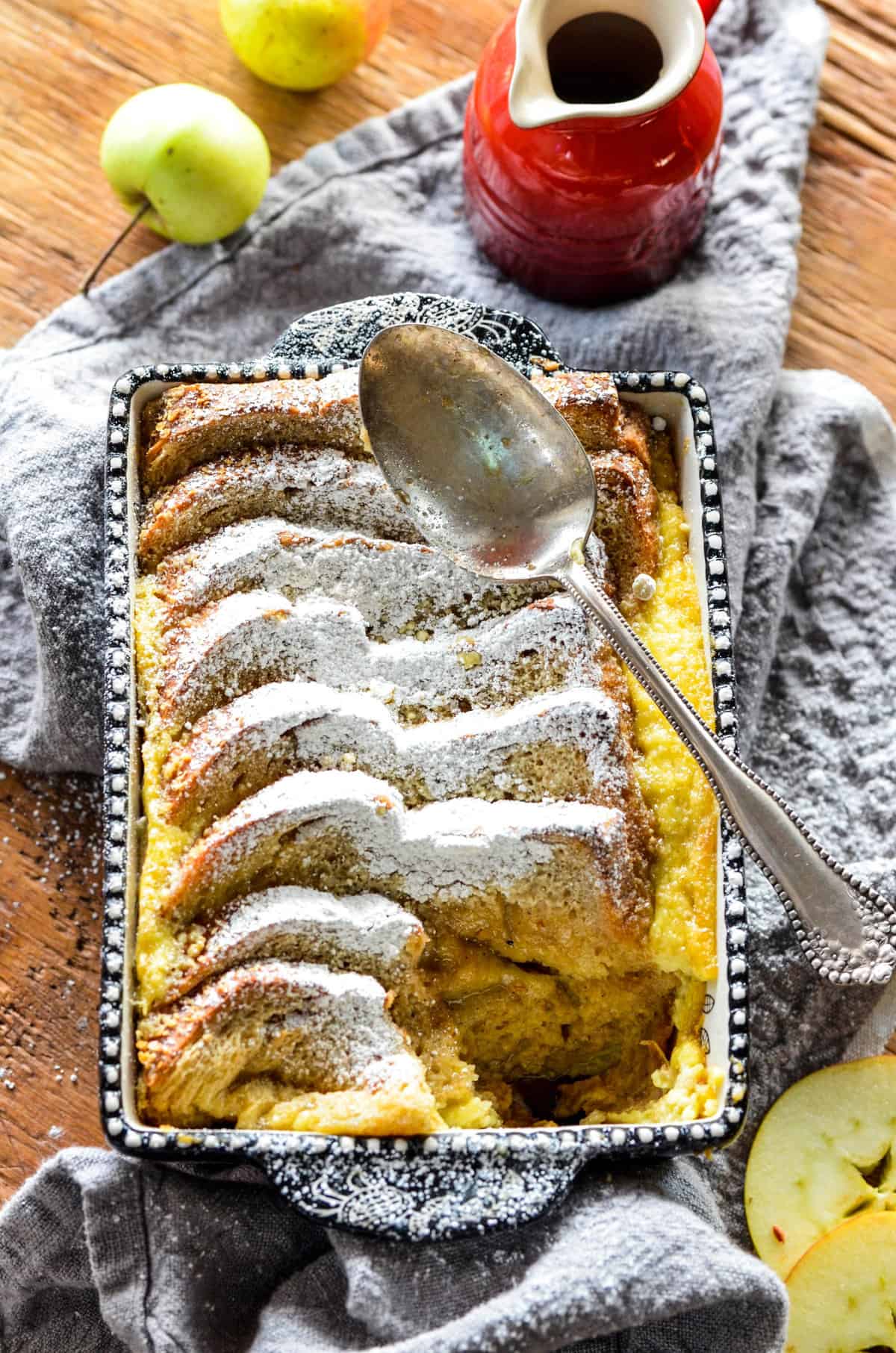 Apple Cardamom Bread Pudding is the best bread pudding we have ever had! This Apple Cardamom Bread Pudding recipe has sweet apples and citrusy cardamom for an indulgent dessert perfect for your next dinner party!