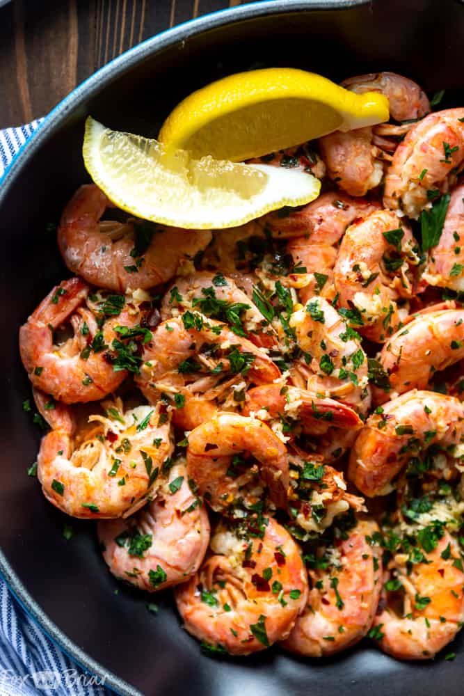 These Easy Garlic Butter Shrimp are the most delicious shrimp you will ever make! Using Argentinian Red Shrimp, garlic, butter and lemon, this simple recipe is packed full of flavor! | Shrimp recipe | Easy shrimp recipe | Garlic shrimp | Shrimp for dinner | Simple Shrimp recipe | Low carb Shrimp recipe | Sauteed shrimp | Quick Shrimp recipe | Lemon garlic shrimp | Skillet shrimp