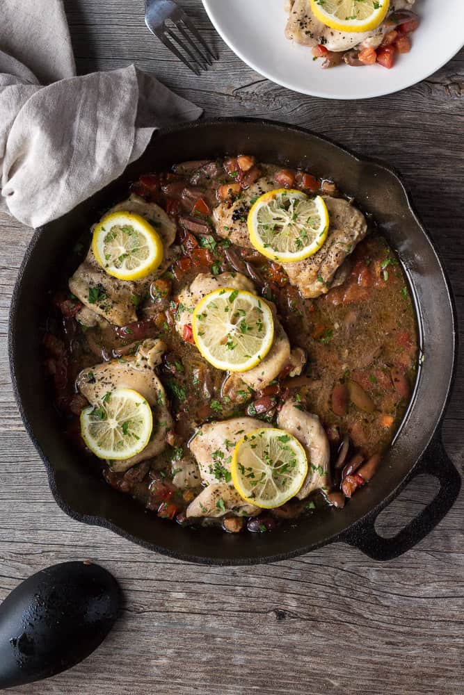 This Greek Chicken Thighs recipe has a simple seasoning and cooks in a cast iron skillet, making cleanup easy. The lemon brings a light, crisp flavor and the kalamata olives provide a touch of saltiness. It’s a quick, one pan dinner perfect for a weeknight! Chicken thigh recipe \ Skillet chiken thighs | Boneless Chicken thigh recipe | Easy weeknight dinner | Quick Dinner recipe | Fast ant healthy dinner recipe | 30 minute dinner recipe