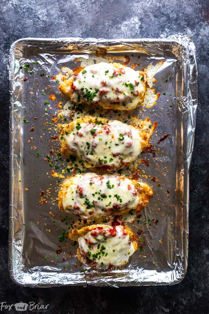 Easy Baked Chicken Parmesan Recipe : Oven Baked Chicken Parmesan - Place the breaded chicken on a lined baking sheet.