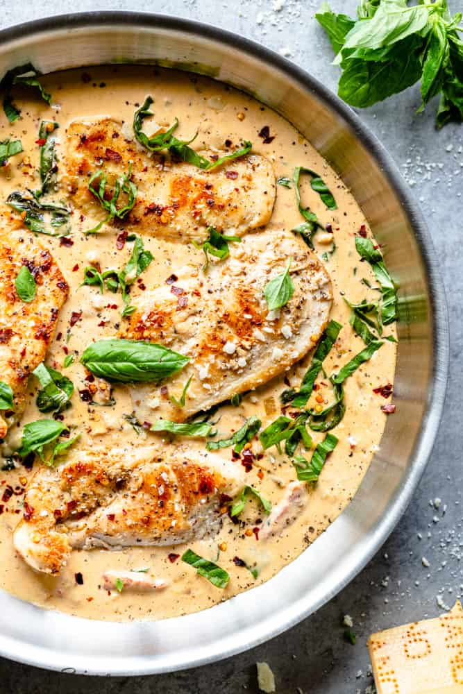 Creamy Basil Chicken recipe close up in a frying pan 