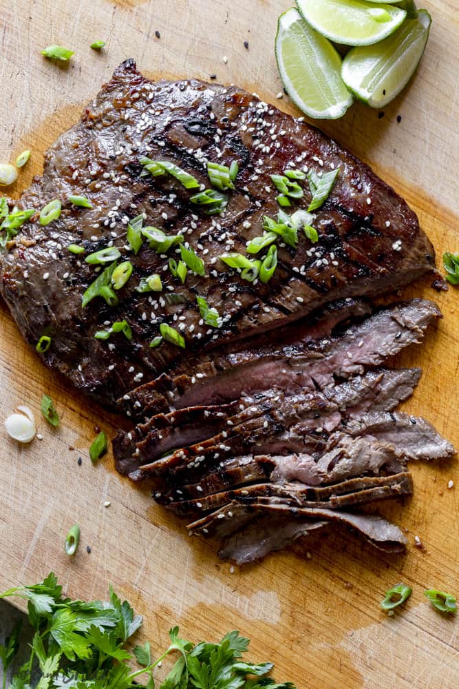 Grilled flank steak on a cutting board