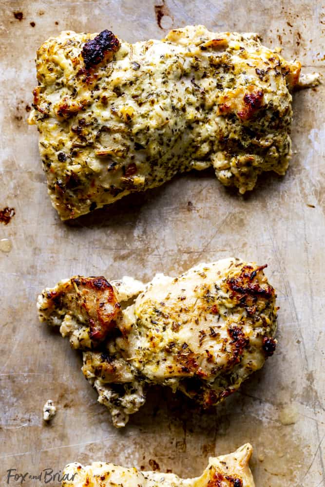 Greek chicken thighs on a sheet pan