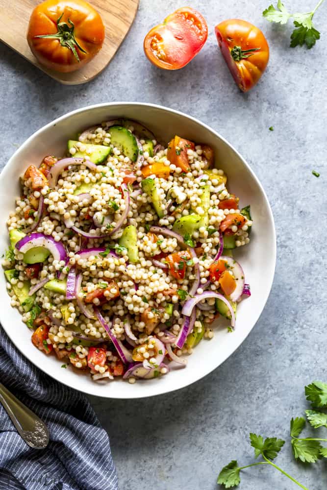 Vegan couscous salad with tomatoes