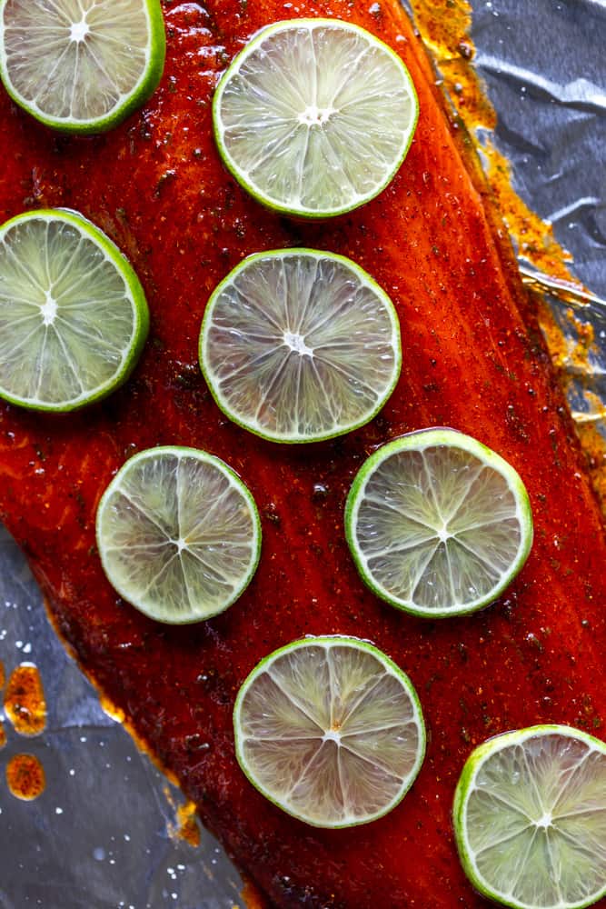 This Chili Lime Baked Salmon is so simple, fast and full of flavor!  A quick chili lime sauce is brushed on the salmon before it is roasted for about 15 minutes.  Try this easy Oven Baked Salmon for dinner tonight! |Easy salmon Recipe | keto low carb | healthy dinner idea | quick salmon recipe | fish recipes | seafood recipes 