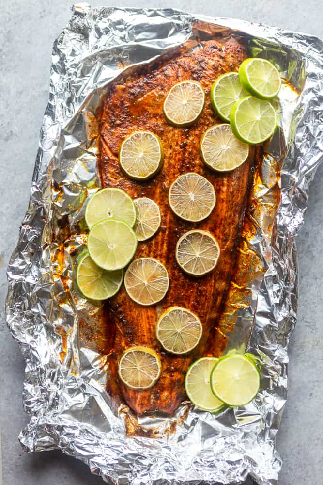 This Chili Lime Baked Salmon is so simple, fast and full of flavor!  A quick chili lime sauce is brushed on the salmon before it is roasted for about 15 minutes.  Try this easy Oven Baked Salmon for dinner tonight! |Easy salmon Recipe | keto low carb | healthy dinner idea | quick salmon recipe | fish recipes | seafood recipes 