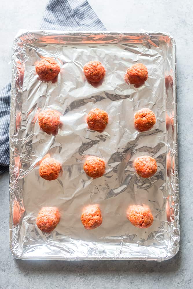 These Baked Korean Meatballs are sweet, spicy, and full of flavor.  This easy ground beef recipe is perfect for a weeknight dinner, and can be made ahead of time. | gochujang meatballs | korean beef meatballs | korean bbq meatballs | gochujang recipe | Ground beef recipes | Easy dinner recipes | Make ahead dinner ideas | freezer meatballs | meal prep