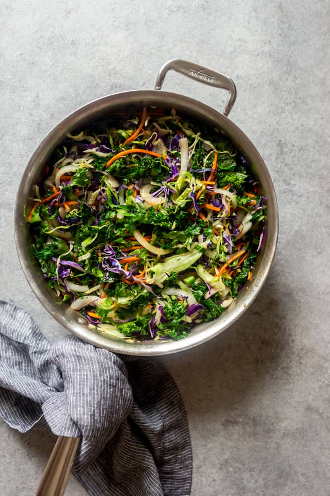 cabbage and kale mixture cooked in a pan