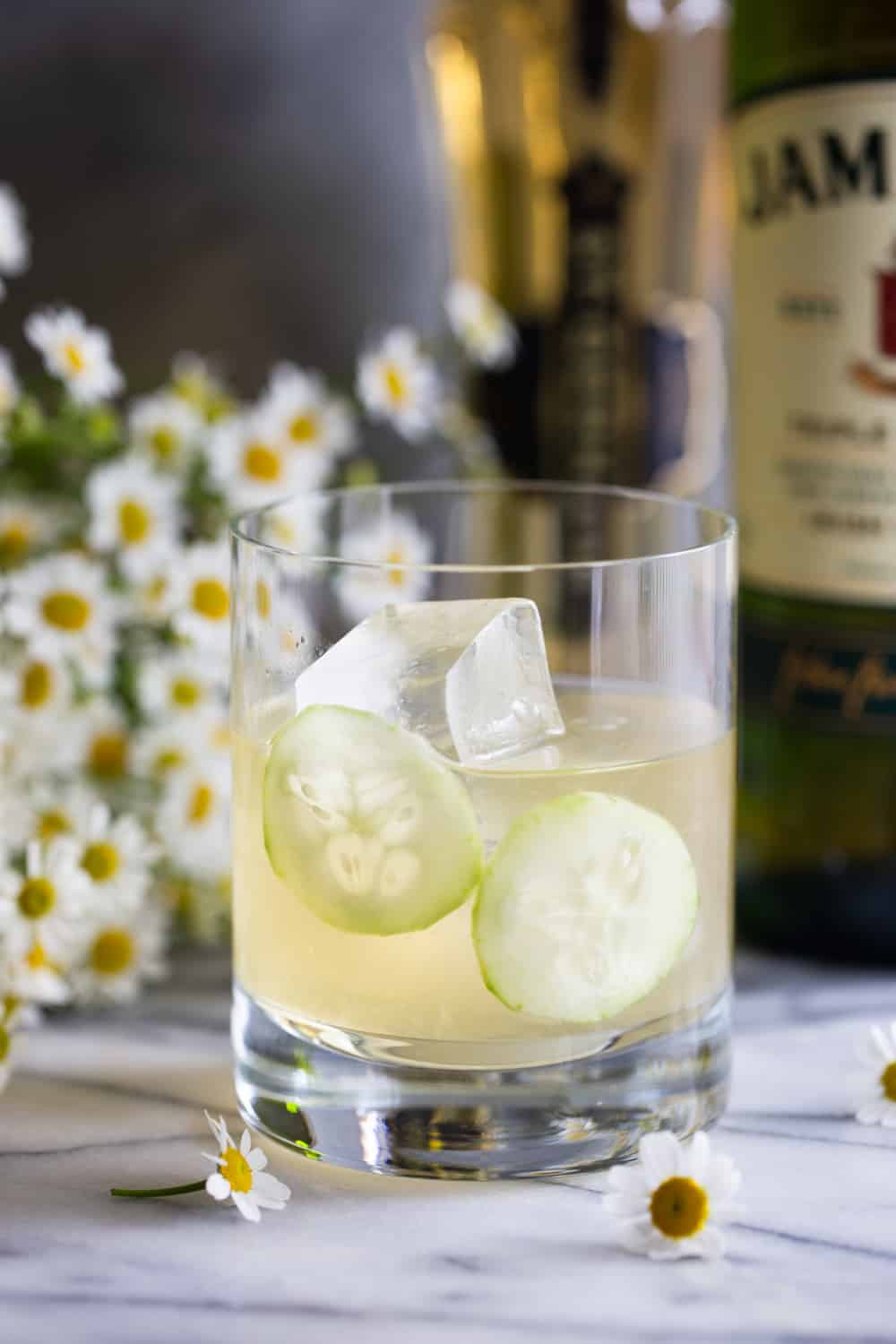 Irish maid cocktail with two cucumber slices for garnish