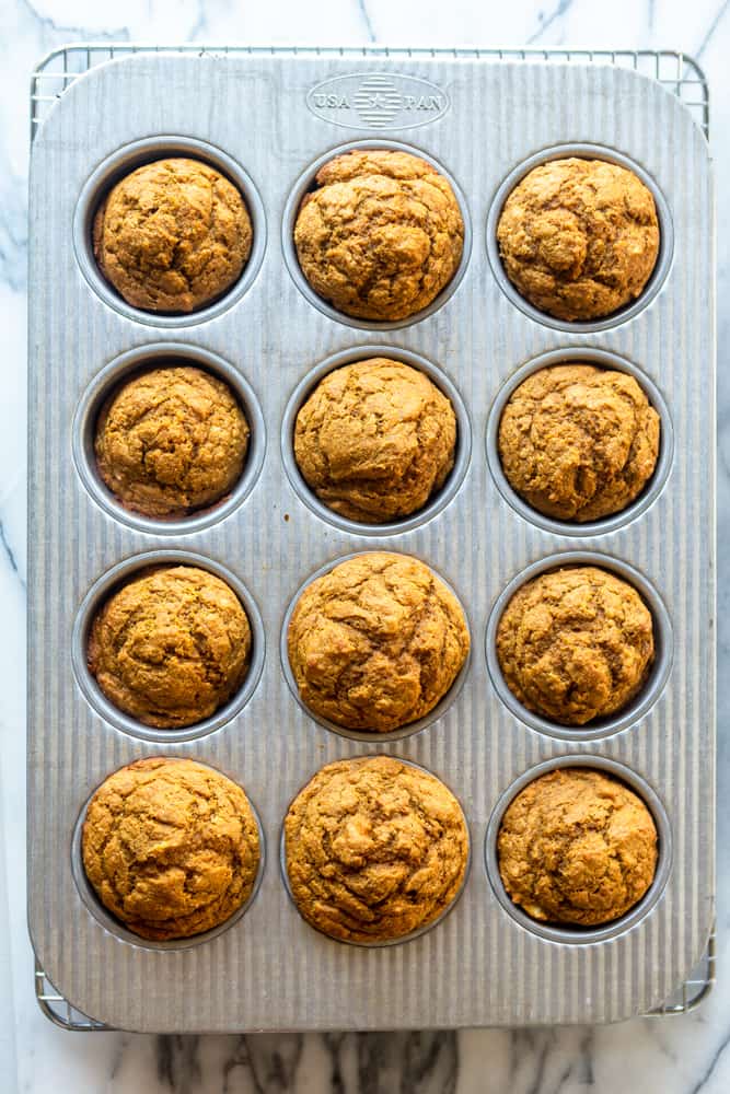 pumpkin banana muffins in a muffin tin