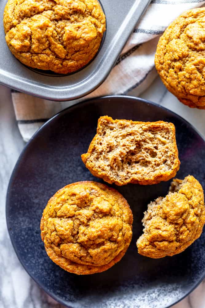 pumpkin banana muffin on a black plate