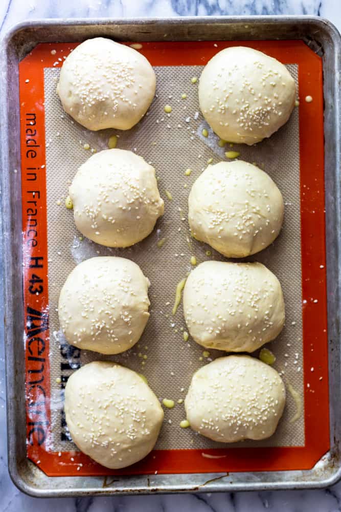 Unbaked hamburger buns ready to go into the oven