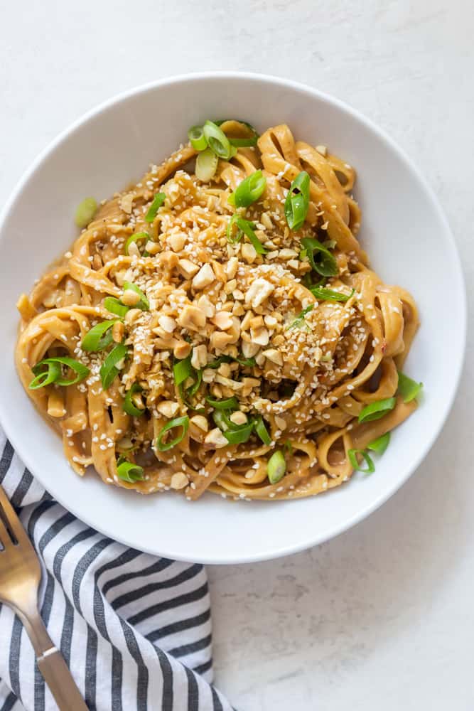 peanut noodles in a white bowl