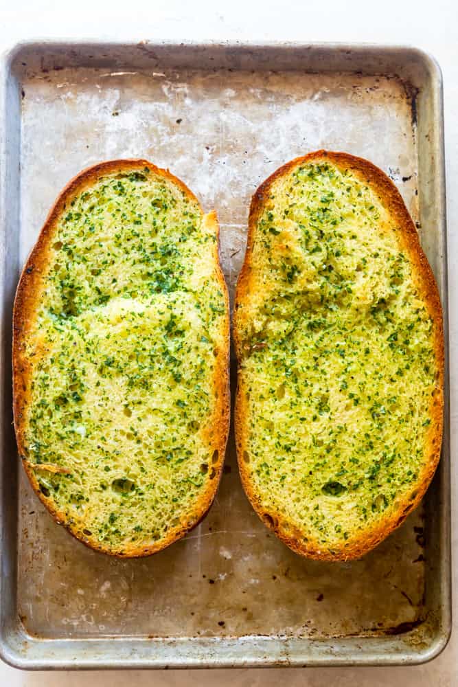 Garlic bread on a baking sheet