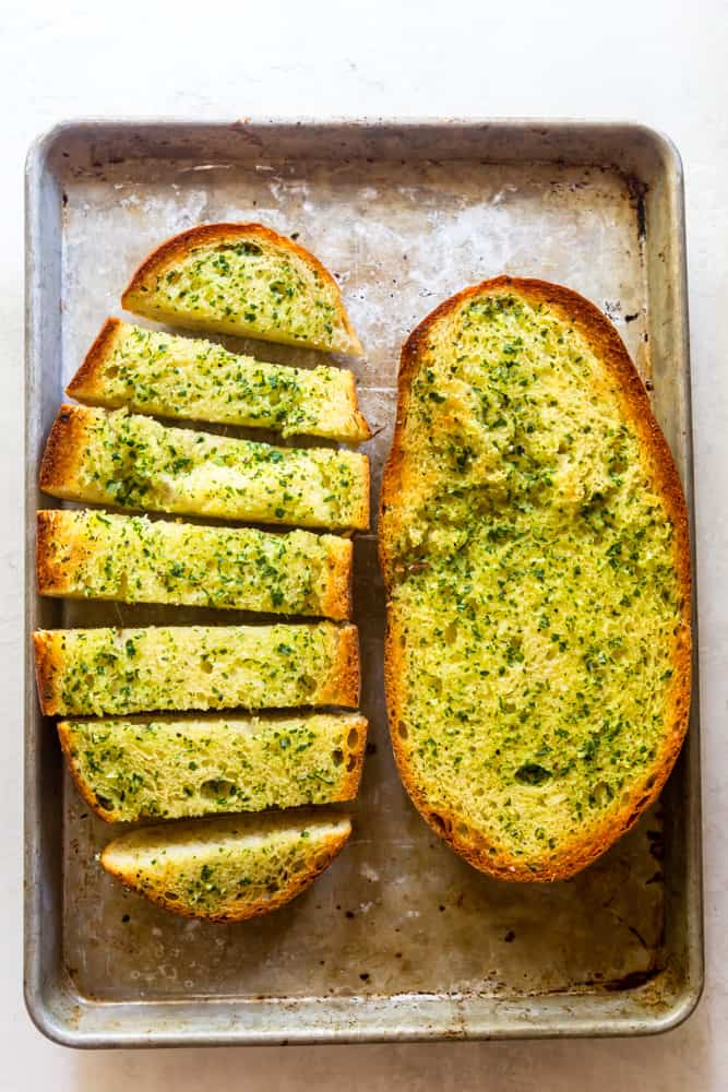 Garlic bread on baking sheet