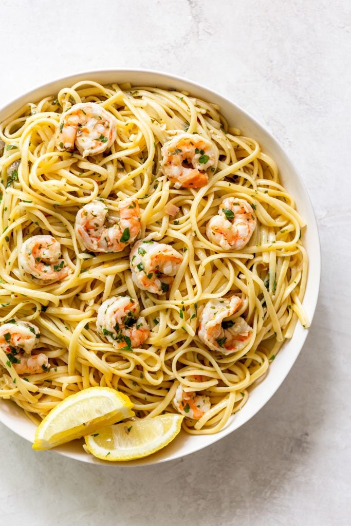Shrimp scampi pasta in a white bowl