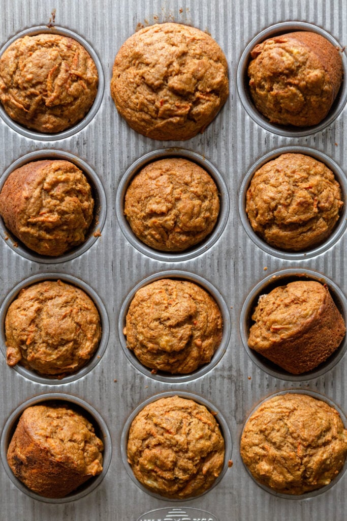 Baked Banana Carrot Muffins in a muffin tin