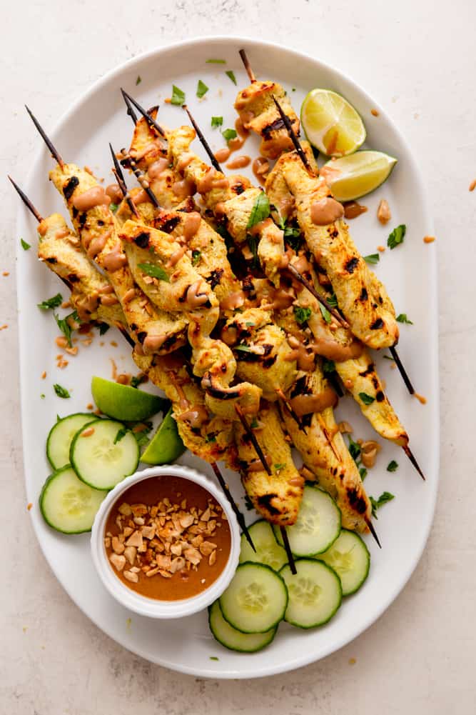 This Easy Chicken Satay with Peanut Sauce tastes just like it came from your favorite Thai restaurant, but it is so simple to make at home! These grilled chicken skewers are perfectly tender with an addictive peanut dipping sauce that you won't be able to resist.