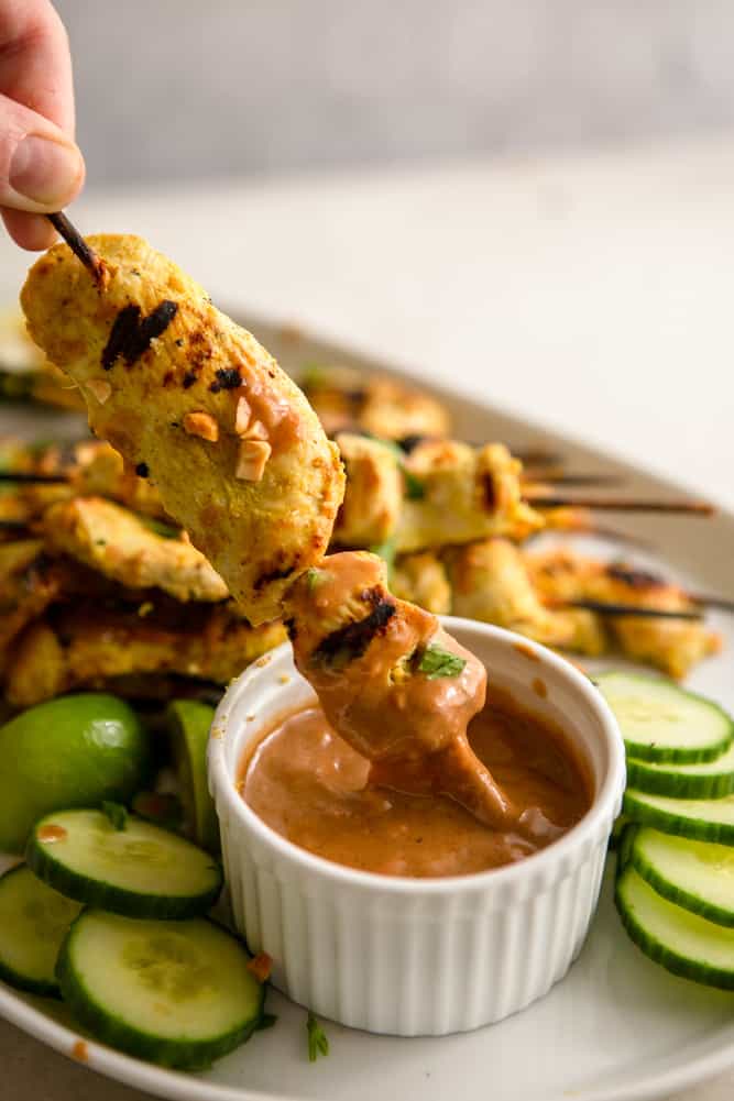 This Easy Chicken Satay with Peanut Sauce tastes just like it came from your favorite Thai restaurant, but it is so simple to make at home! These grilled chicken skewers are perfectly tender with an addictive peanut dipping sauce that you won't be able to resist. 