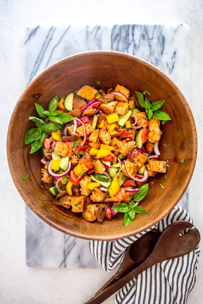 Panzanella salad in a large wooden salad bowl