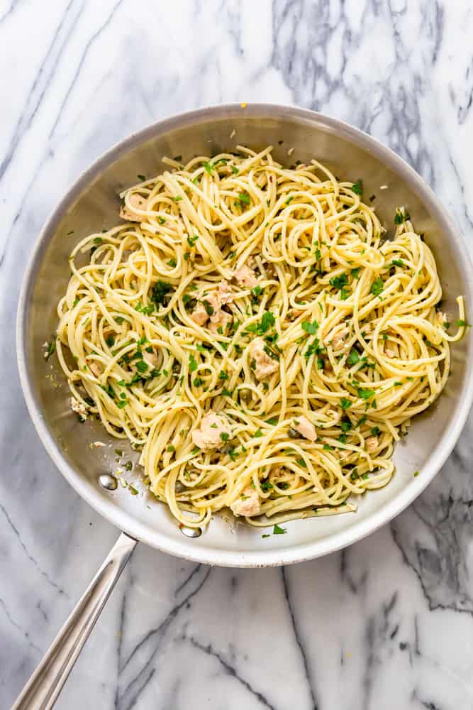A stainless steel saute pan with tuna pasta in it.