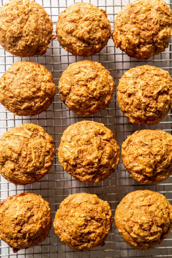 Healthy apple muffins on a cooling rack