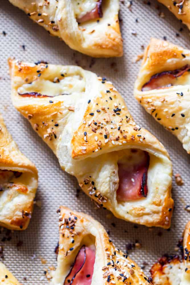 ham and cheese puff pastry bundle topped with everything bagel seasoning.