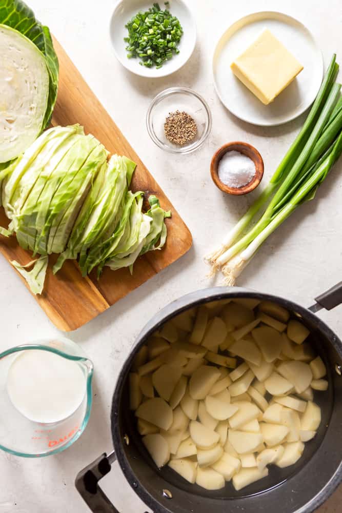 Ingredients for Colcannon - cabbage, green onions potatoes, milk, butter, salt and pepper.