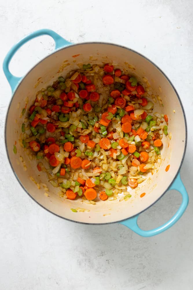 Carrots, celery and onions in a Dutch oven