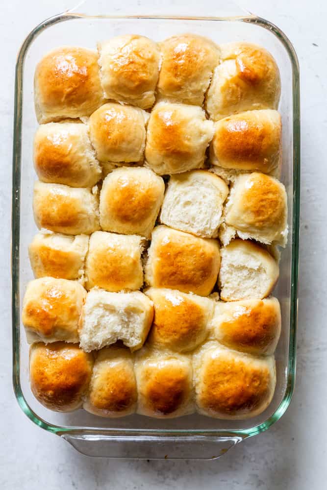 Soft and fluffy dinner rolls in a glass 13X9 pan