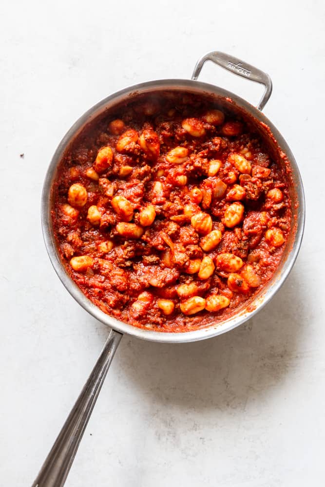 One Pot Gnocchi with Sausage in a skillet, before cheese is added.