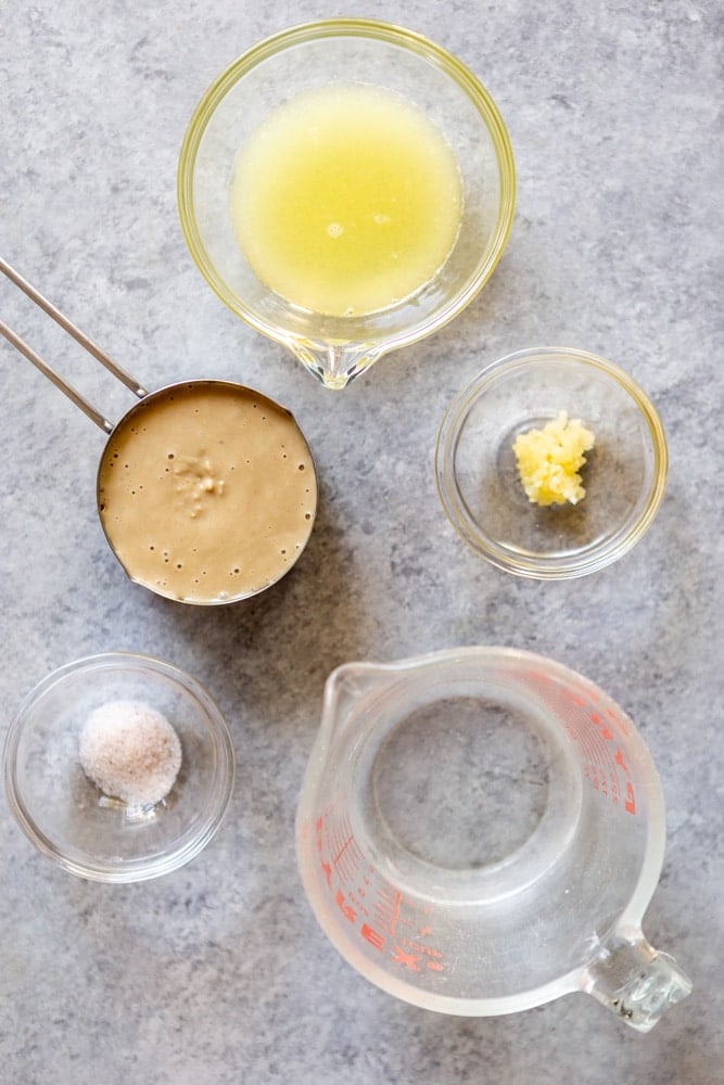 Ingredients for tahini sauce: Lemon juice, tahini, sea salt, garlic and water.