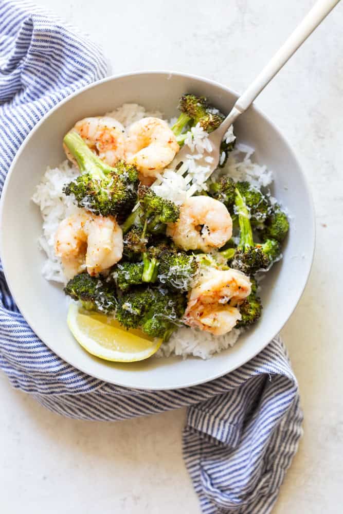 Roasted shrimp and Broccoli in a bowl with rice.