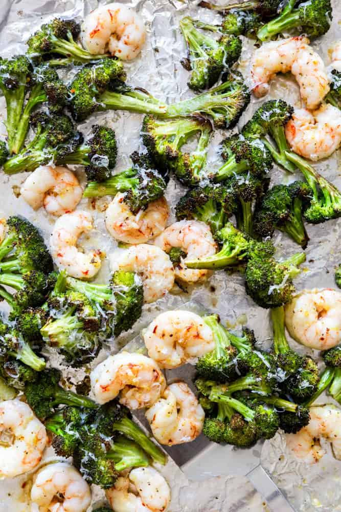 Sheet pan roasted shrimp and broccoli with parmesan.