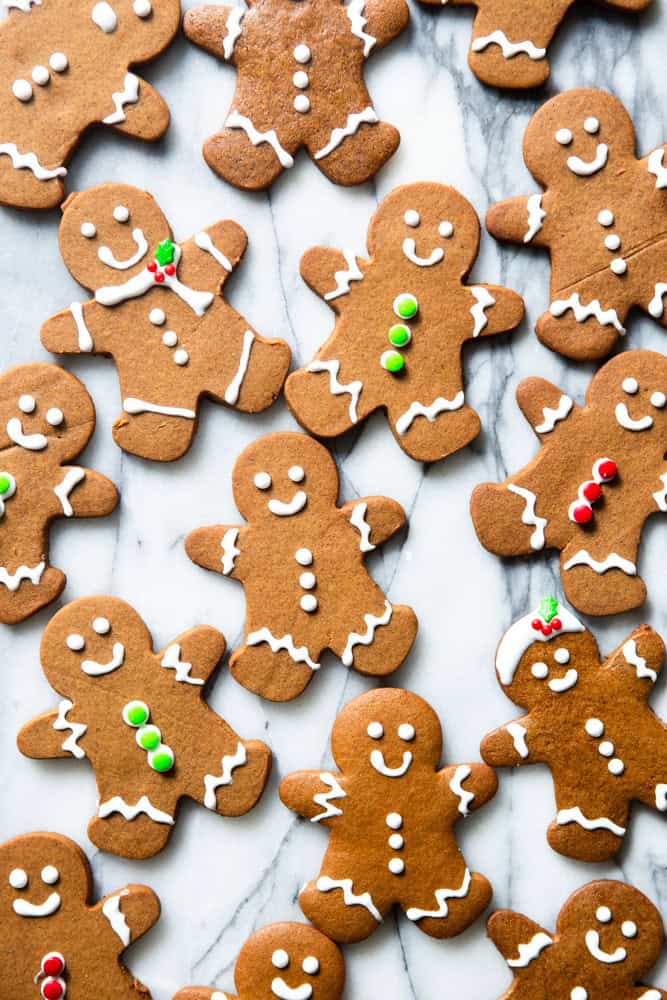 Gingerbread man cookies decorated with royal icing and candies.