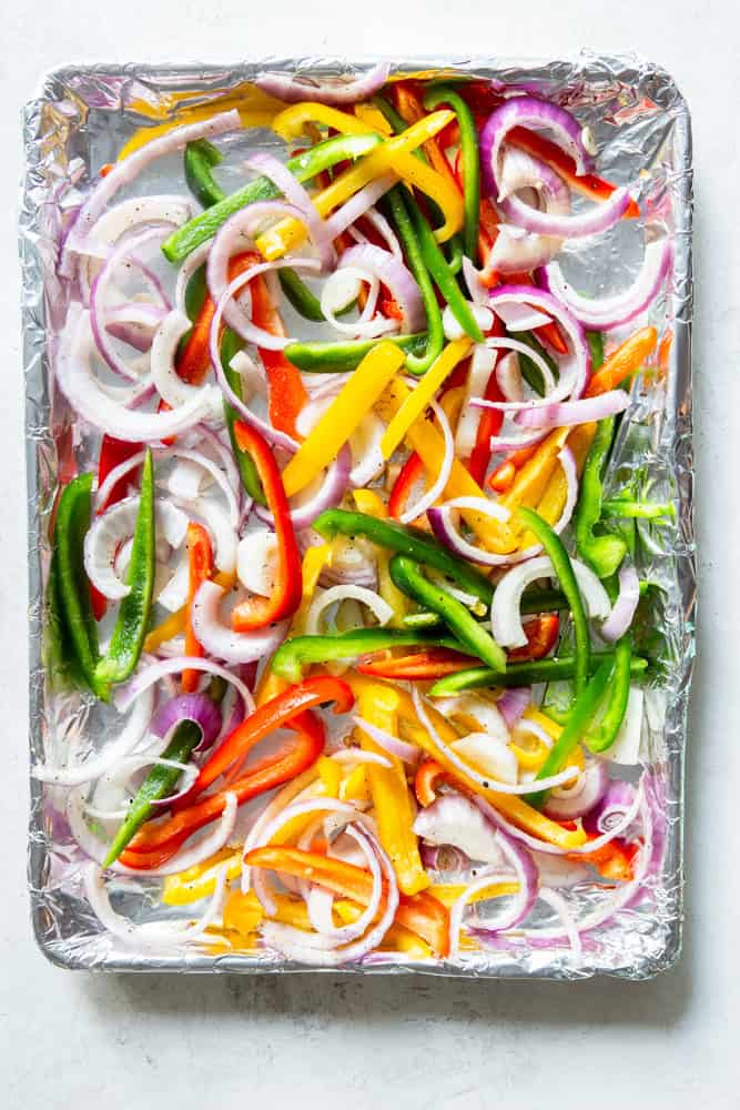 Onions and peppers before being cooked