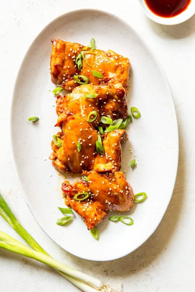 Soy Ginger Chicken Thighs on a white platter.
